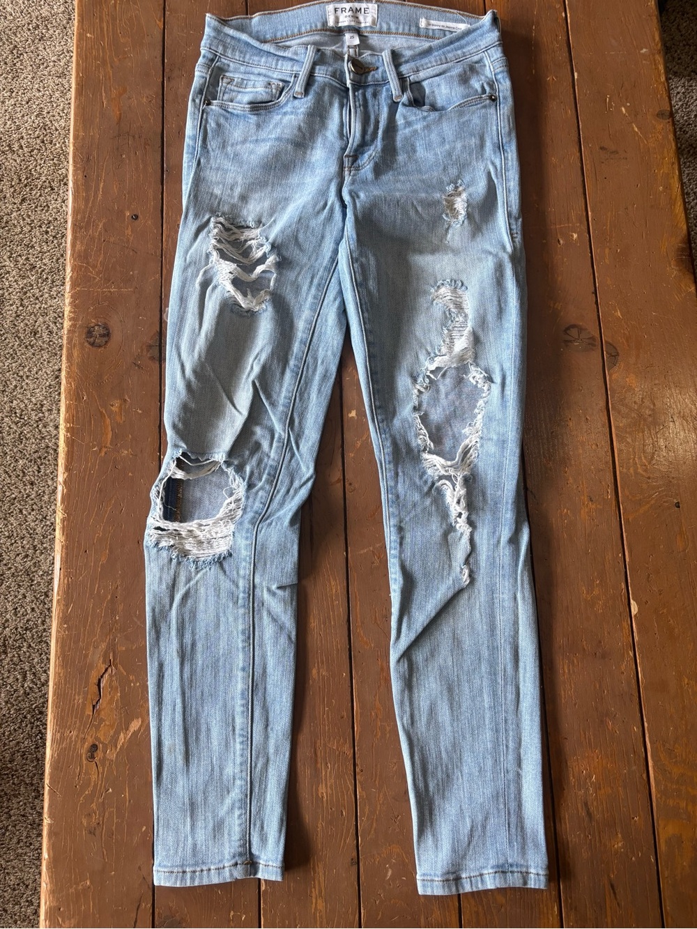 Frame Denim Le Skinny De Jeanne distressed crop jeans in a light blue